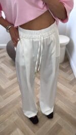 Kelnės Silk White